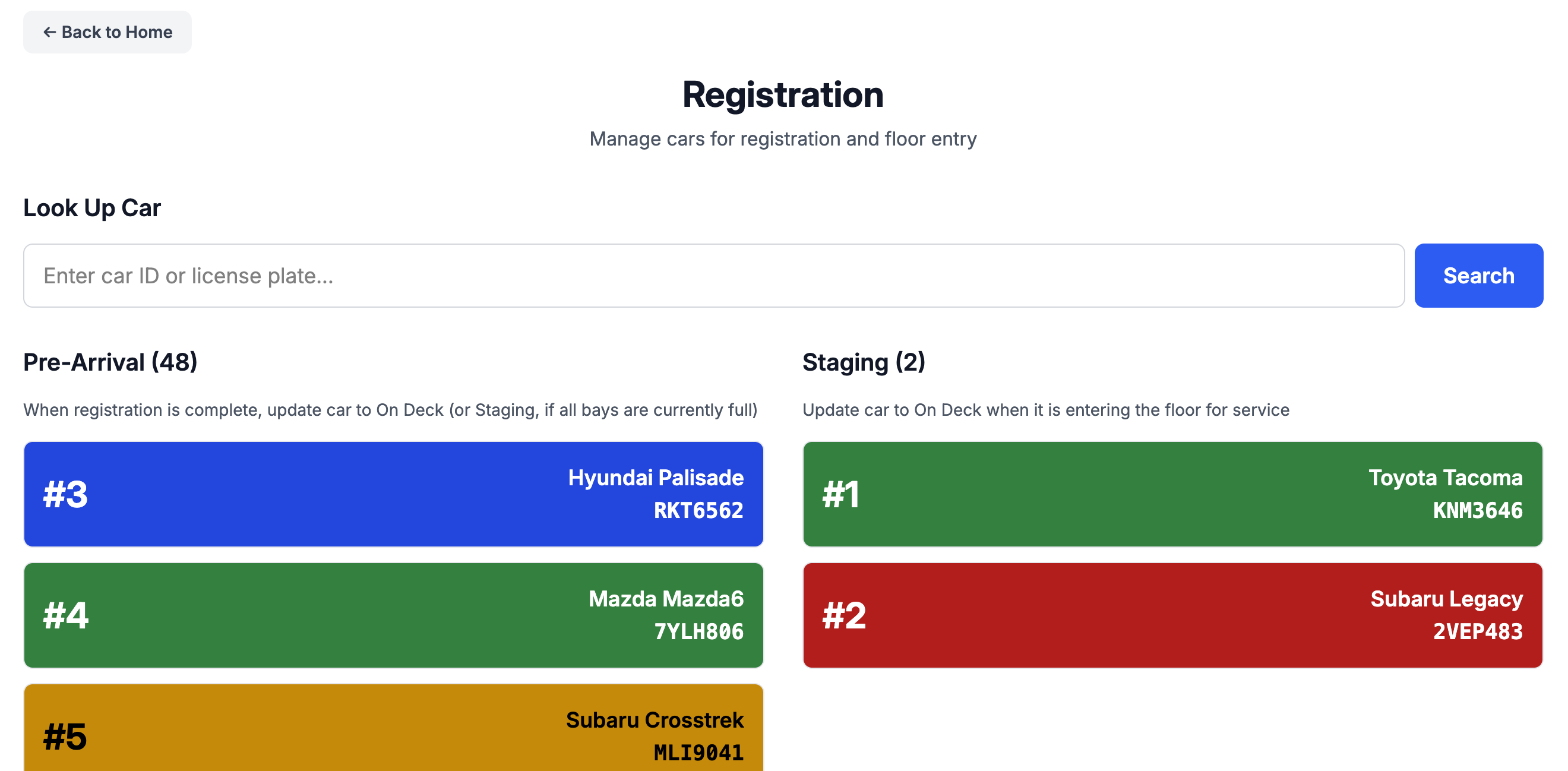 Screenshot of the Registration screen of the car tracker app, showing some cars in pre-arrival status and two in staging